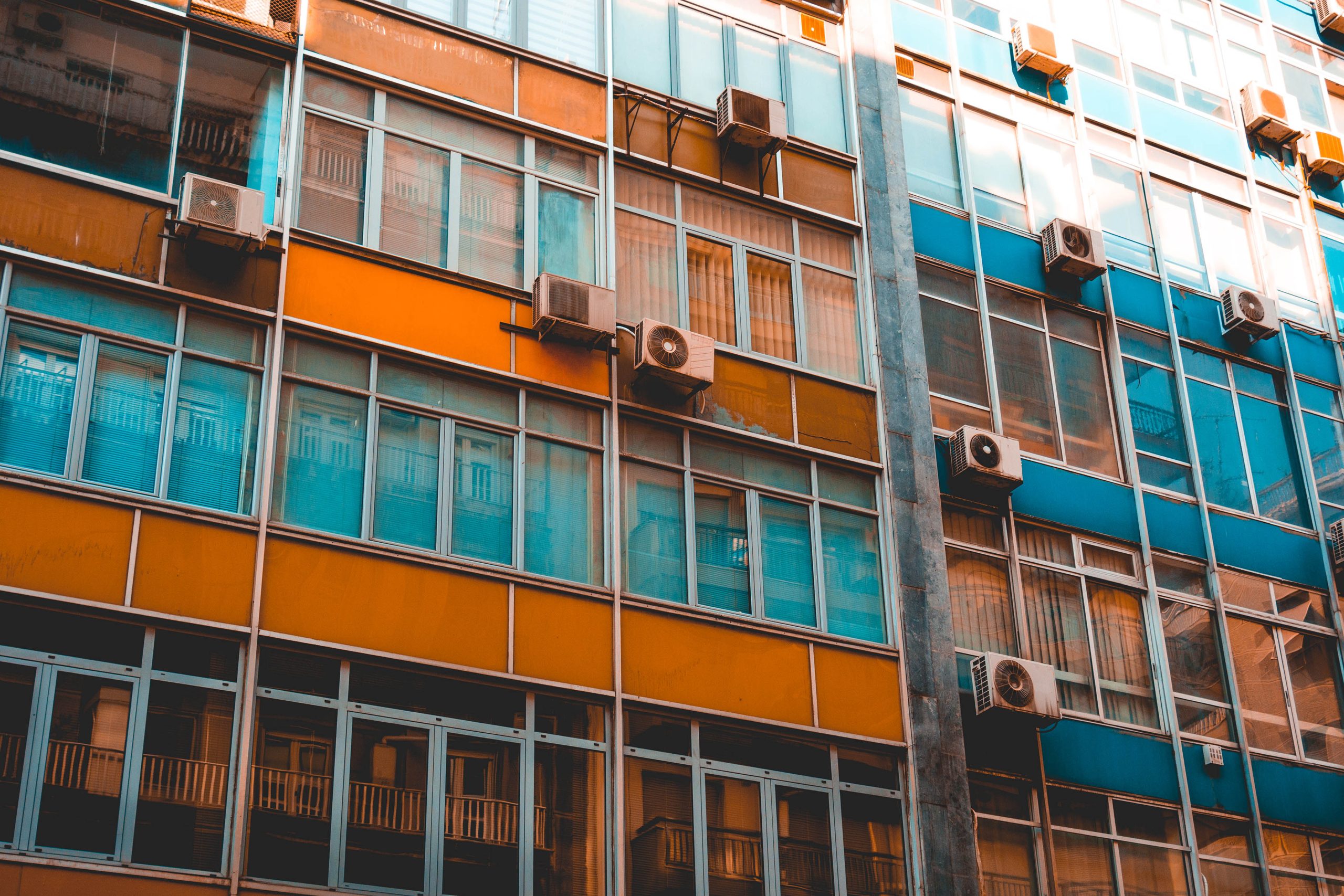 Projects orange and blue colored industrial facade 2026 01 09 13 13 31 utc